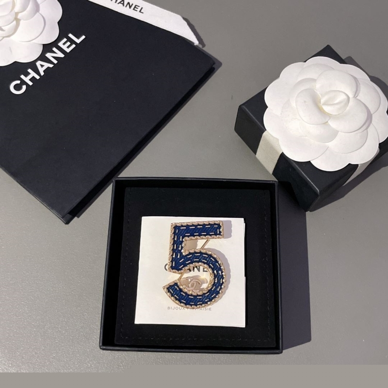 Ch*el brooches